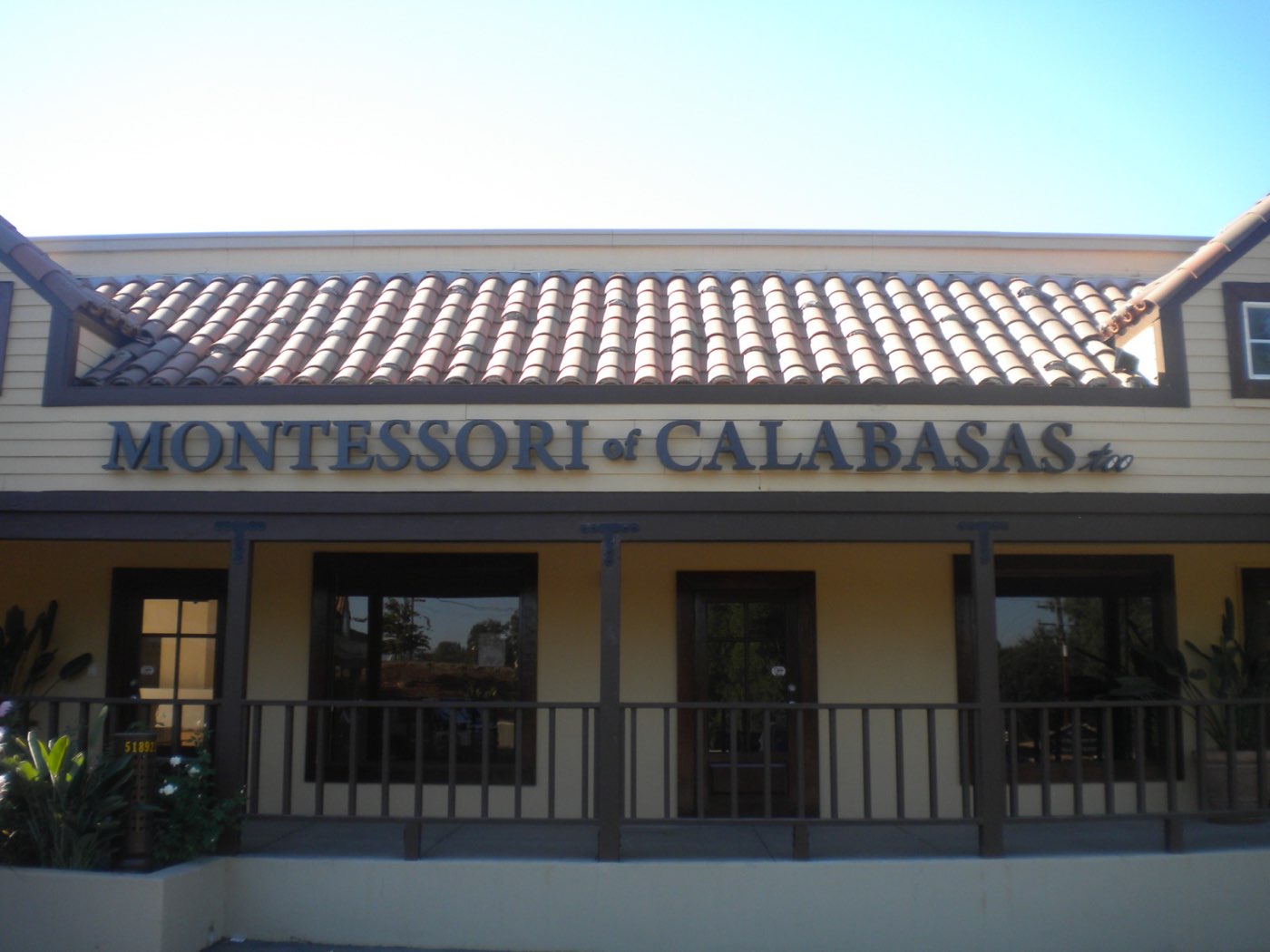 Dimensional letters installed on a school storefront