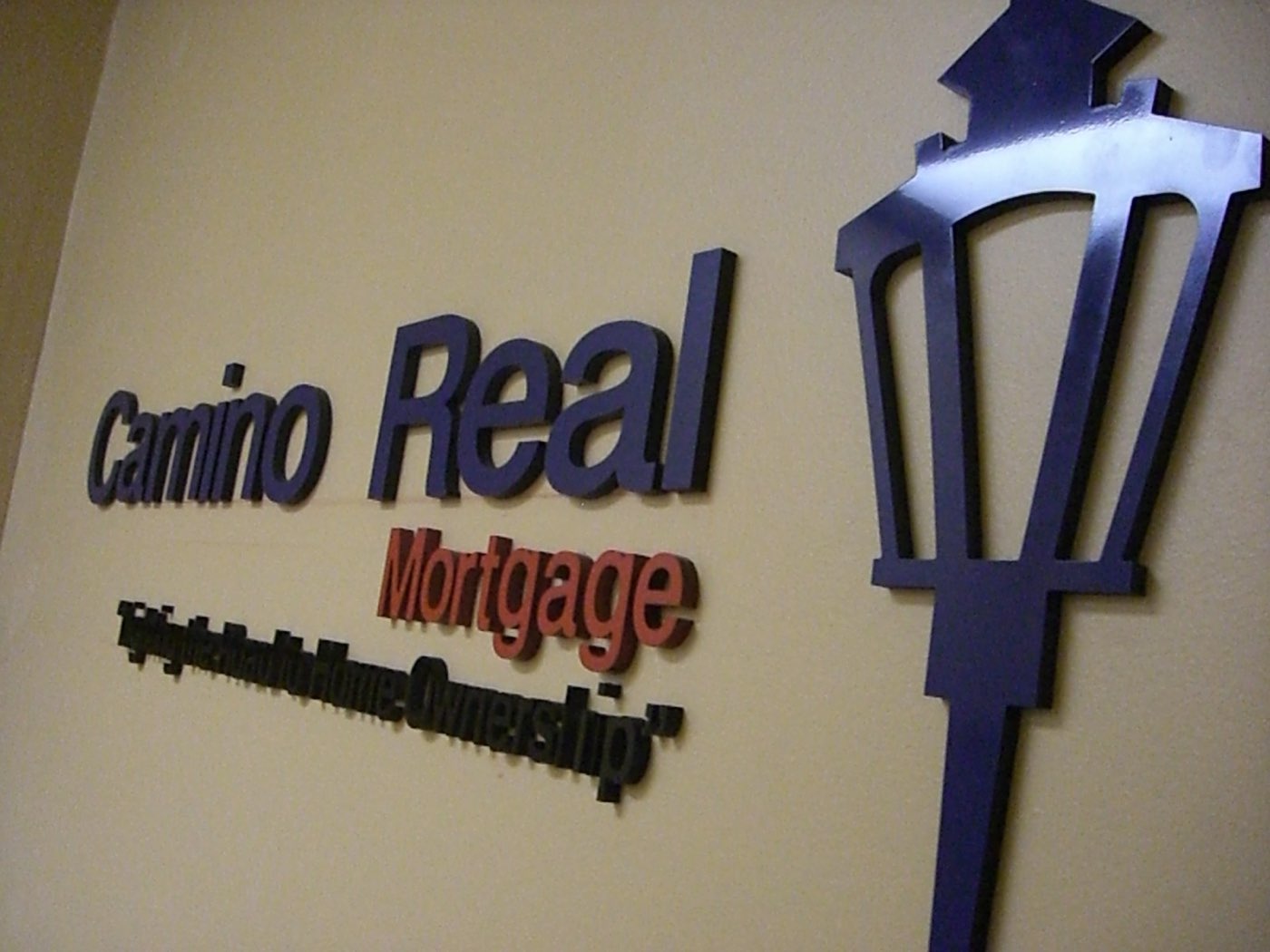 Three-dimensional logo and letters installed in an office