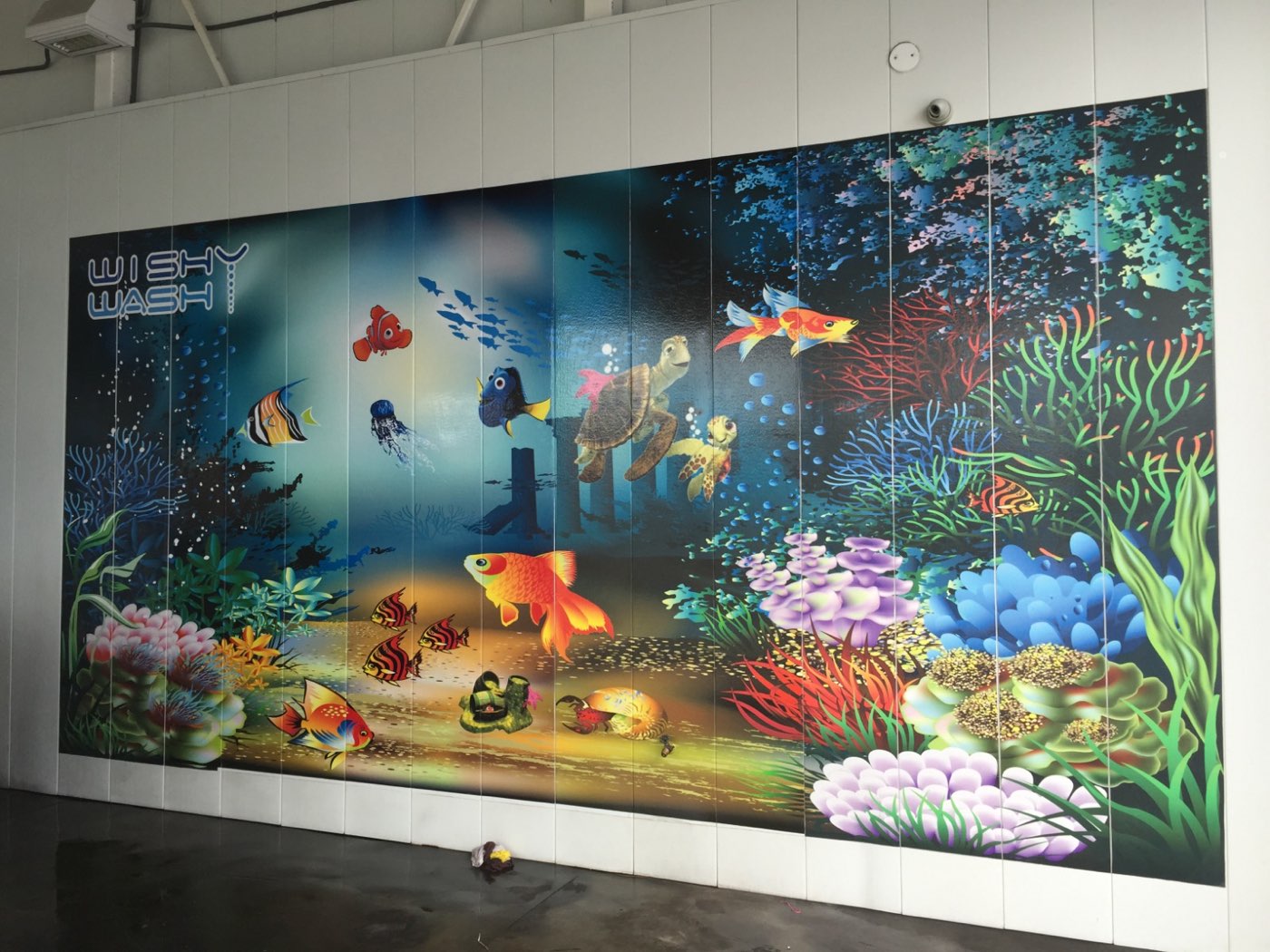 Printed aquarium mural installed inside a business